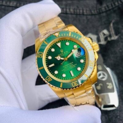 ROLLEX SUBMARINER GOLD GREEN AUTOMATIC HEAVY 476